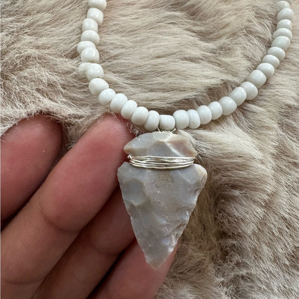 Elegant White Beaded Necklace with Arrowhead Pendant